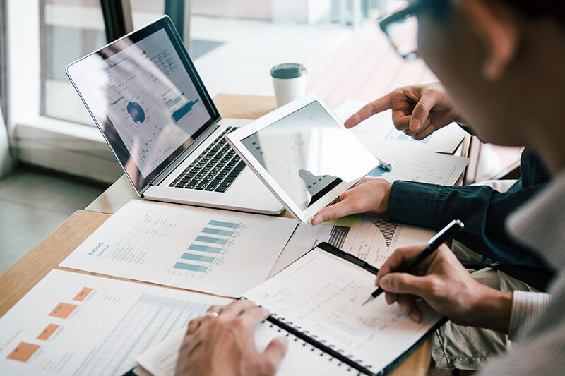 Business people using a laptop